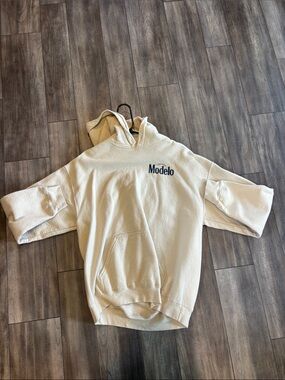 ModelCo Cream Hoodie with Vintage Beer Label Print